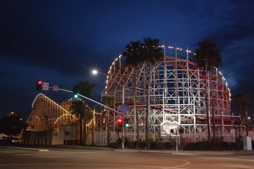A night view of the Giant Dipper roller coaster in Belmont Park, San Diego