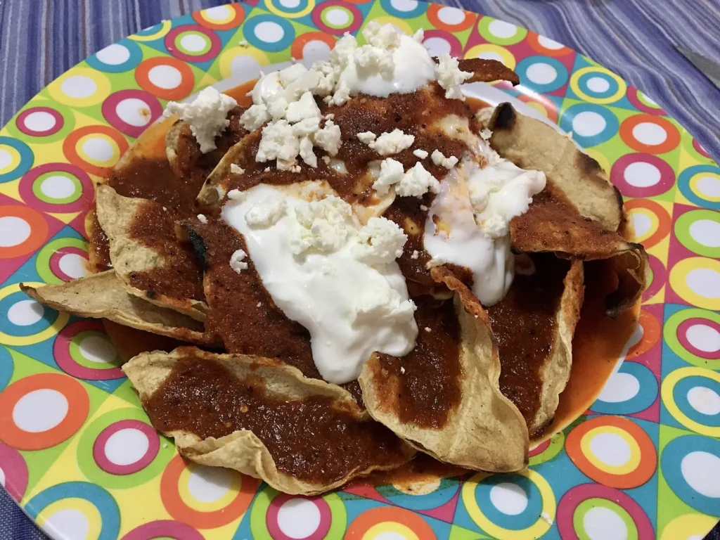 Chilaquiles with crema and cheese