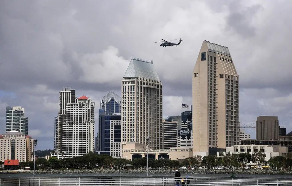 SAN DIEGO An SH-60F Sea Hawk helicopter flies over downtown San Diego during flight operations