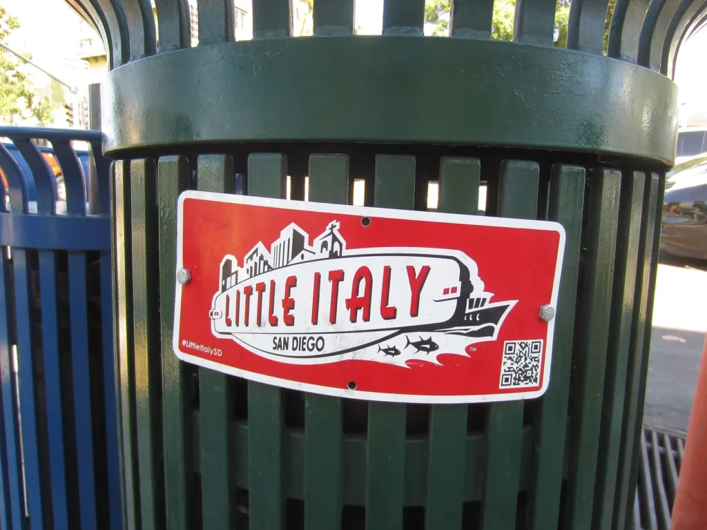 A Little Italy sign on a street bin in San Diego