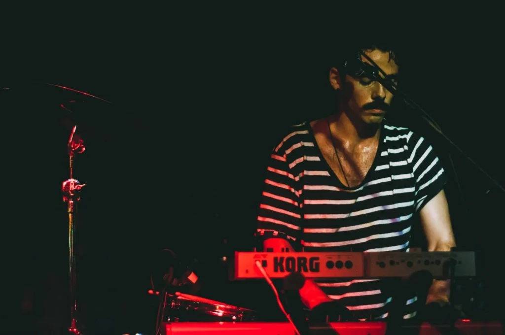 A band performing live at the Casbah, a small music club in San Diego