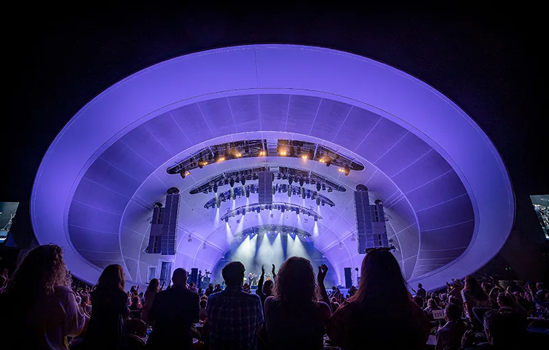 The Rady Shell at Jacobs Park lit up at night during a concert, San Diego
