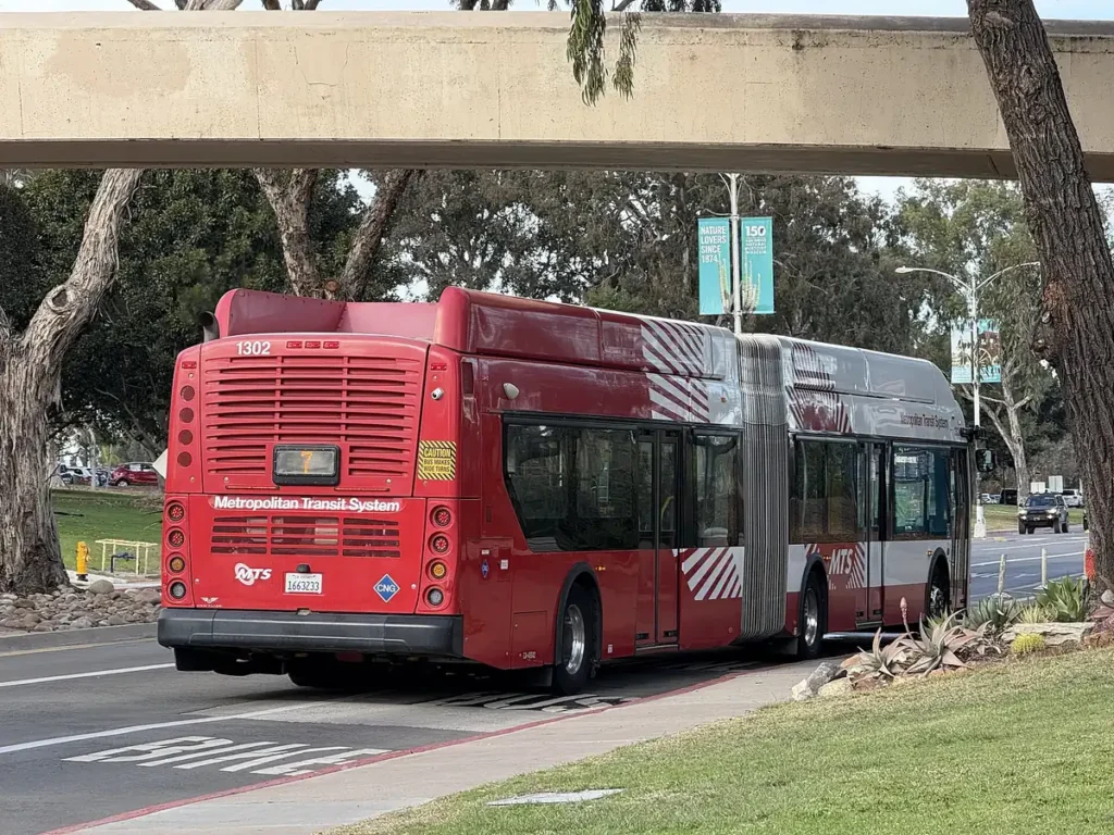 A NFI XN60 bus on route 7 on in Balboa Park