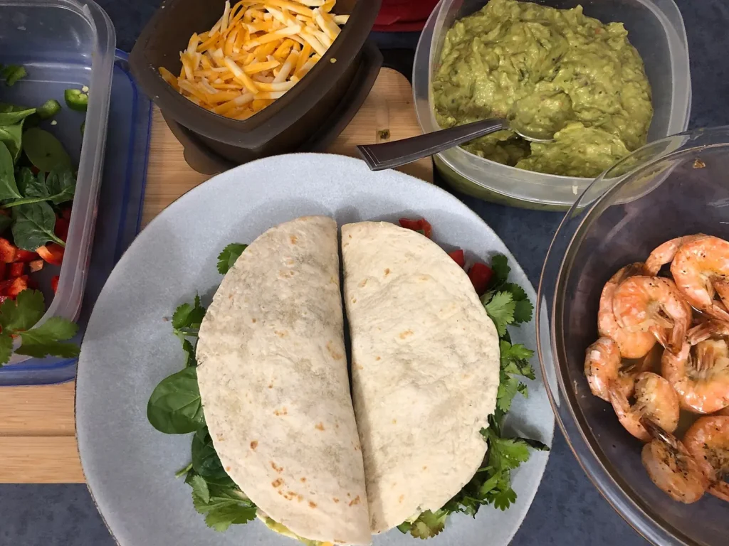 Shrimp tacos with salsa and guacamole