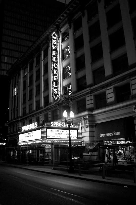 The historic Spreckels Theatre marquee at night on Broadway, San Diego