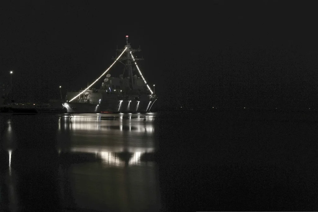 U.S. Navy ships display holiday lighting while moored at Naval Base San Diego Dec. 20